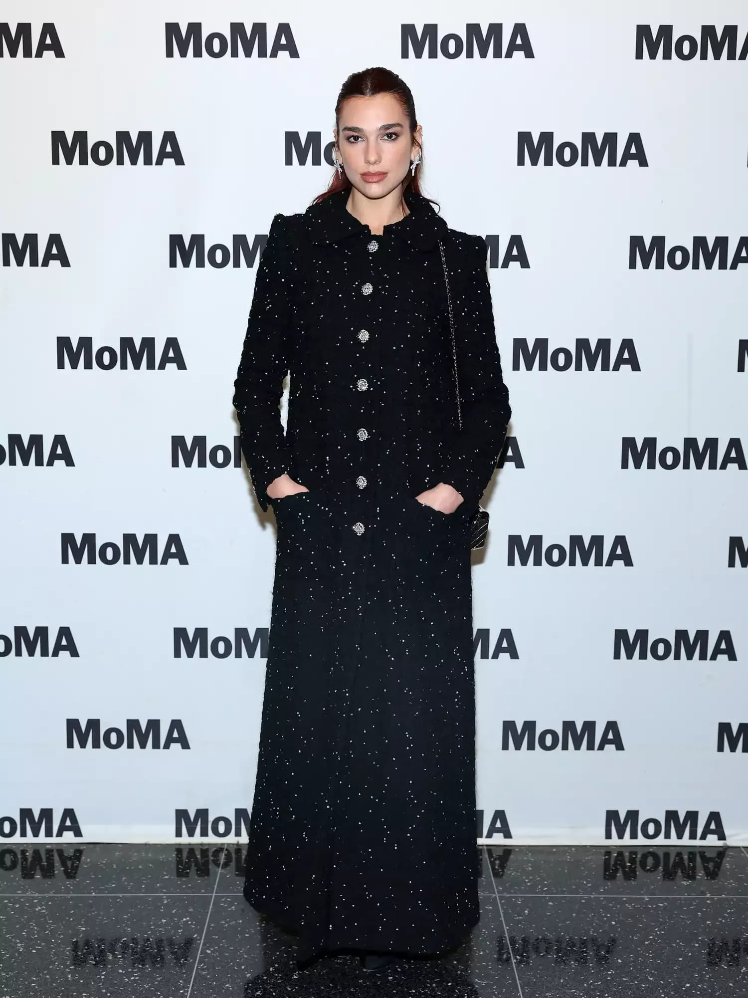 Dua Lipa Rocks Goth-Glam Look with a Sheer Lace Catsuit and Transparent Skirt