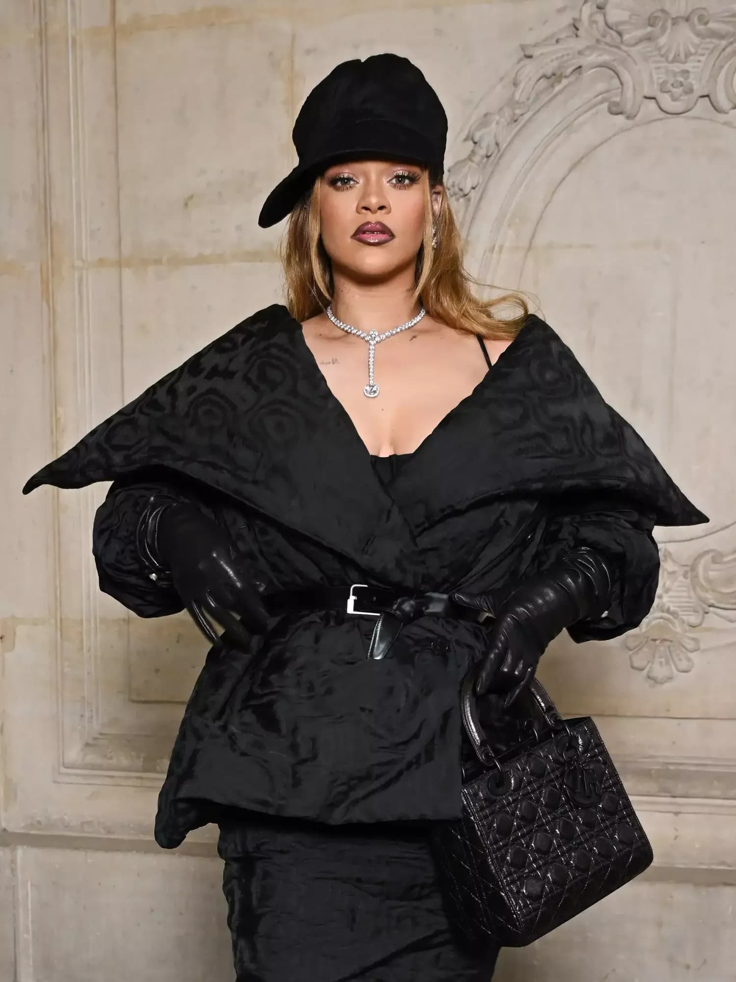 Rihanna Elevates Her Skirt Suit Look with a Surprisingly Unconventional Accessory