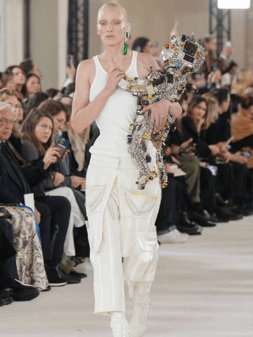 Daniel Roseberry was inspired by perspective as we come to terms with the rise of artificial intelligence and how it will devour our humanity. His inspiration was reflected in his Schiaparelli SS24 Haute Couture collection.