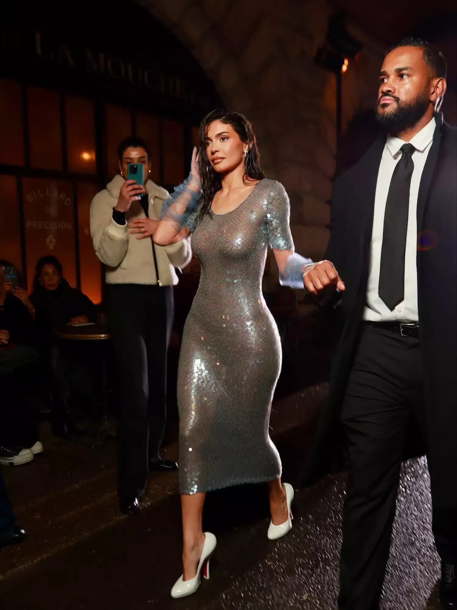 Kylie Jenner Dazzles in a Fully Sheer Sequined Dress Paired with Slouchy Gloves