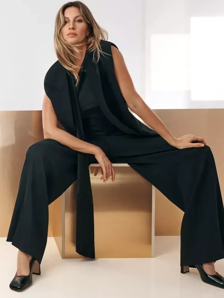 Gisele Bündchen Infuses Business Casual with a Sultry Edge in Sheer Sweater