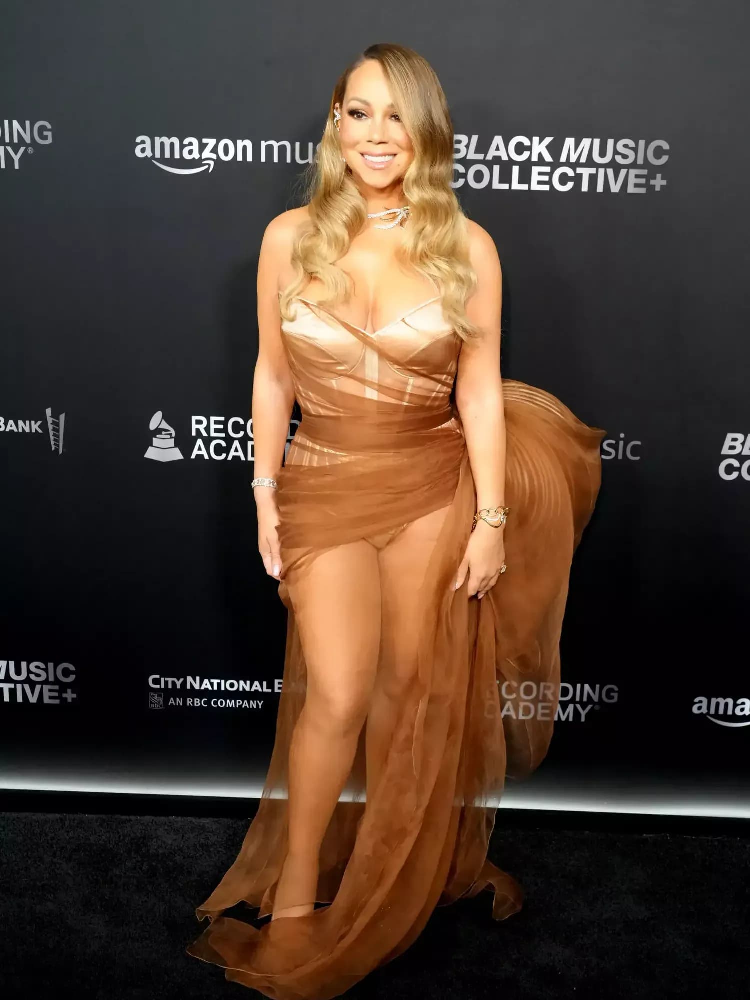 Mariah Carey Dons Lingerie-Inspired Ensemble for Red Carpet Appearance