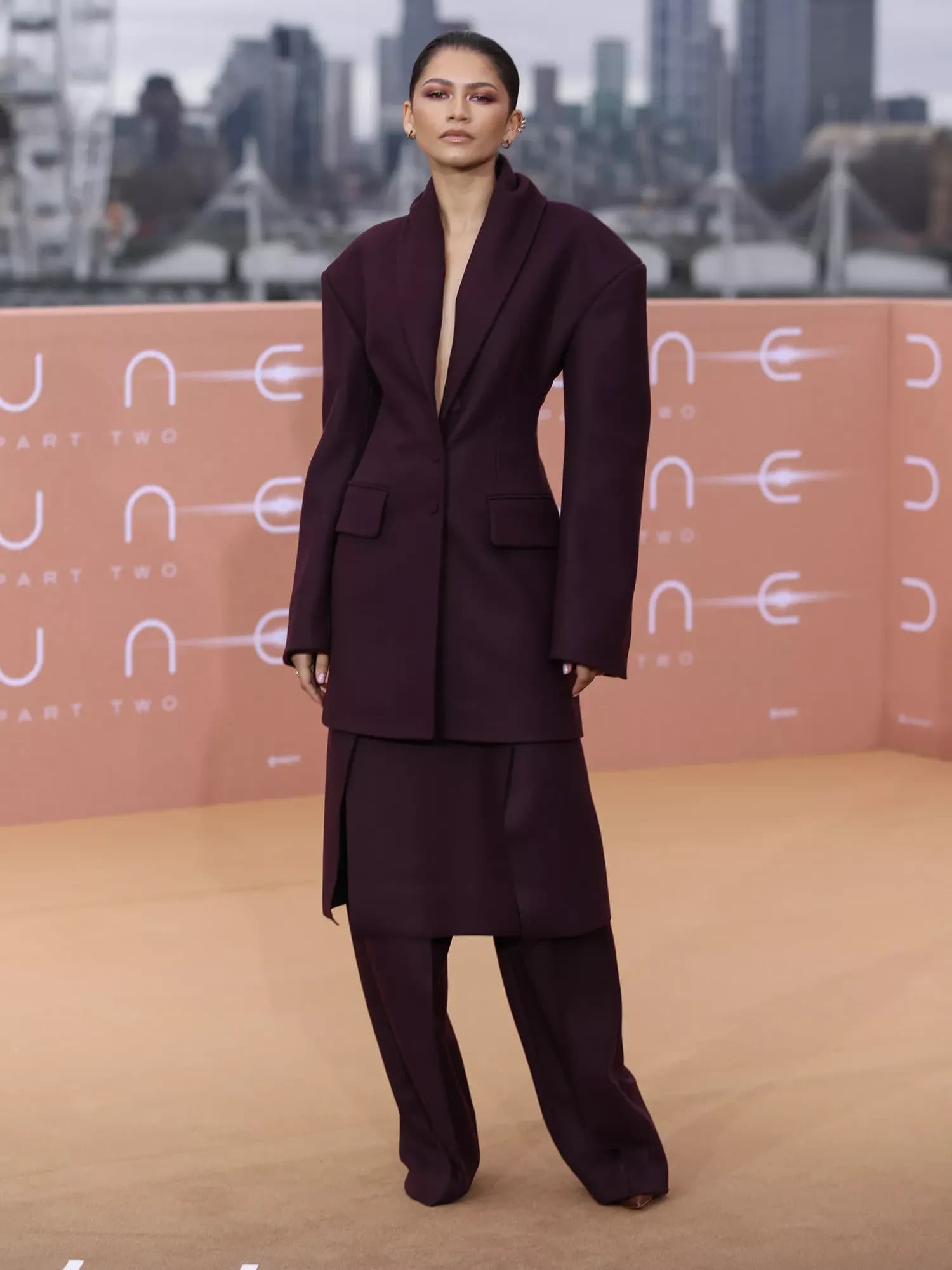 Zendaya Dares to Bare with a Plunging Blazer, Skipping the Top Altogether