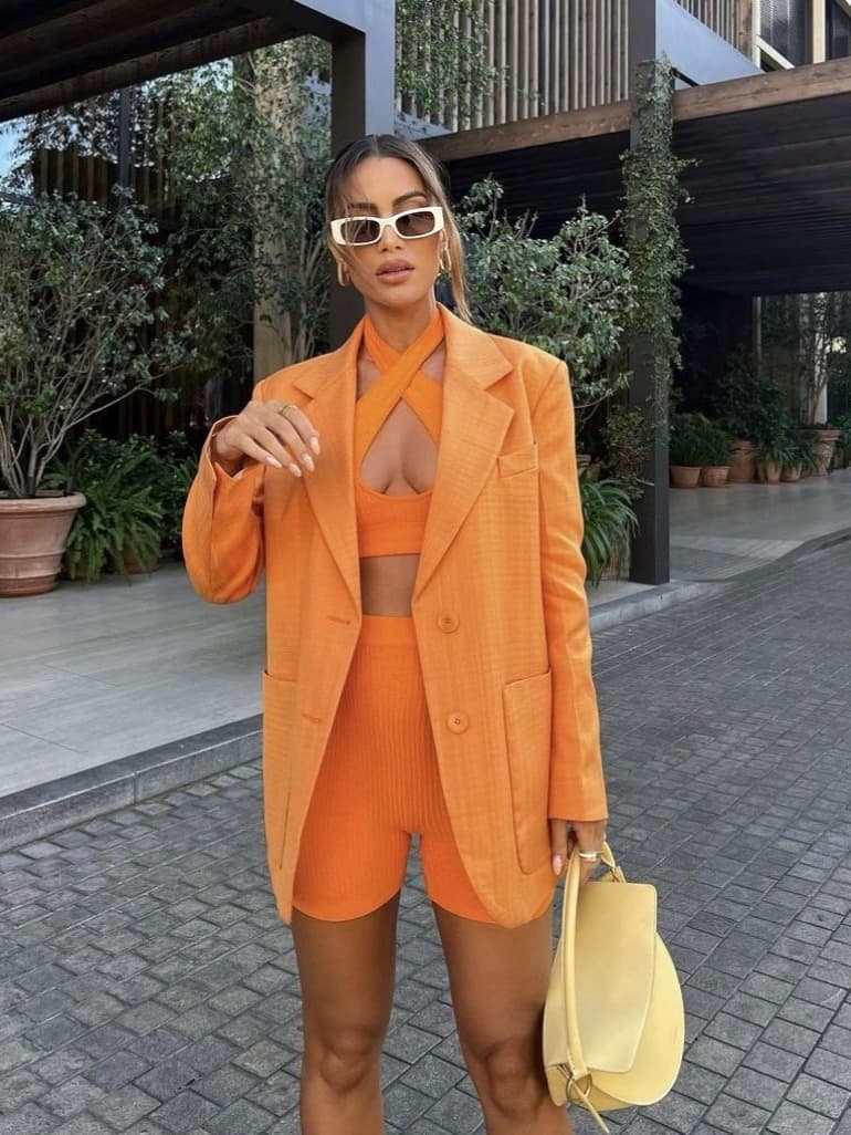 Step into Taylor Swift’s Orange Era with striking street-style inspiration from Paris, New York, Milan, and Copenhagen for your TS12-ready outfits.