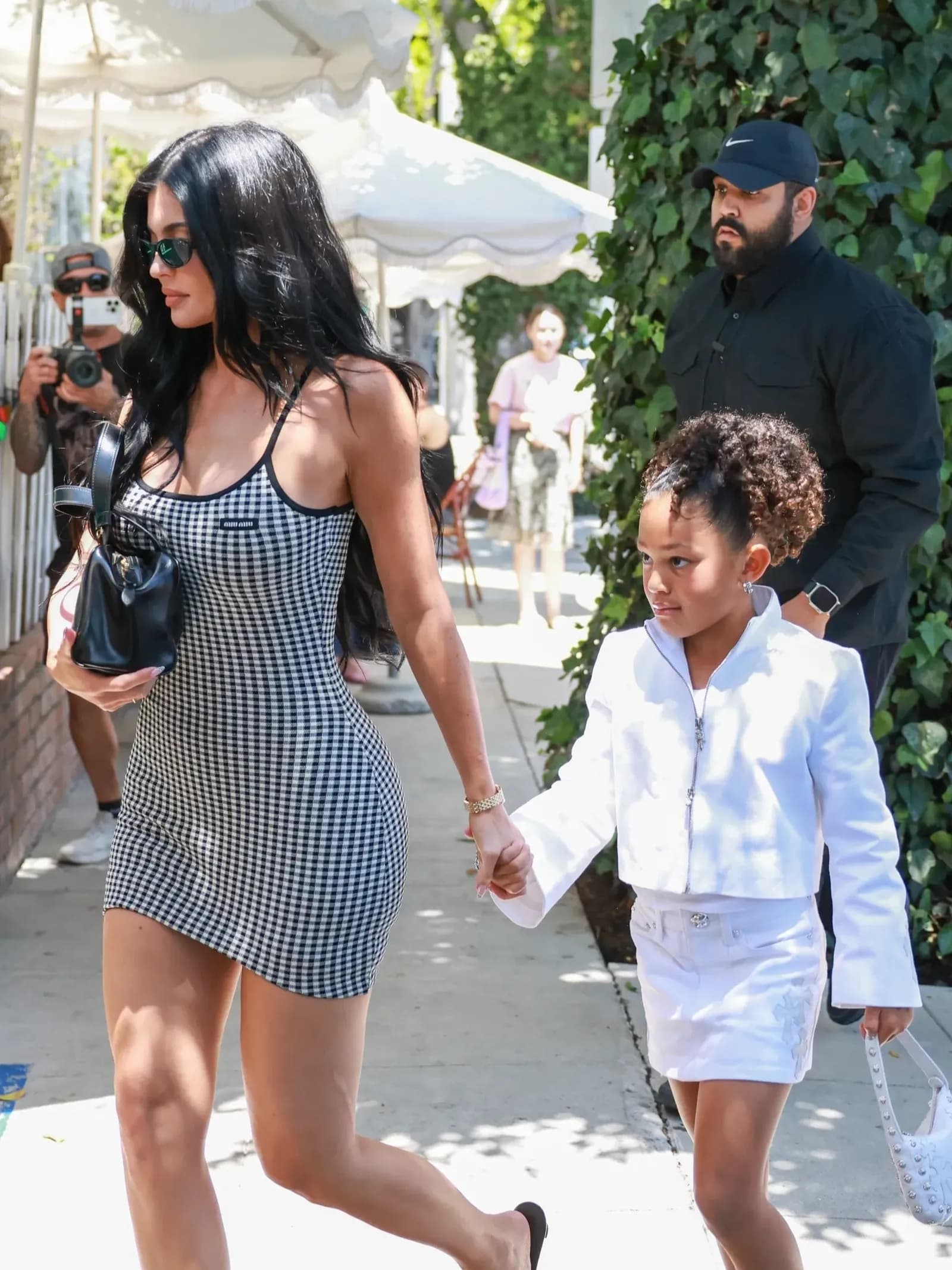 Kylie Jenner and Stormi Webster step out in chic coordinated looks in Los Angeles, showcasing a modern take on mother-daughter dressing.