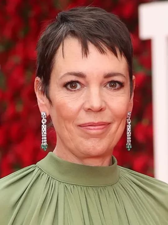 Olivia Colman stuns in a sage green Elie Saab gown at The Roses premiere—discover this autumnal hue and how to wear it stylishly.