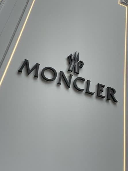 Edward Enninful debuts his Moncler Genius collection—an all-black, high-fashion wardrobe for wind, sand, and snow, merging couture and function.
