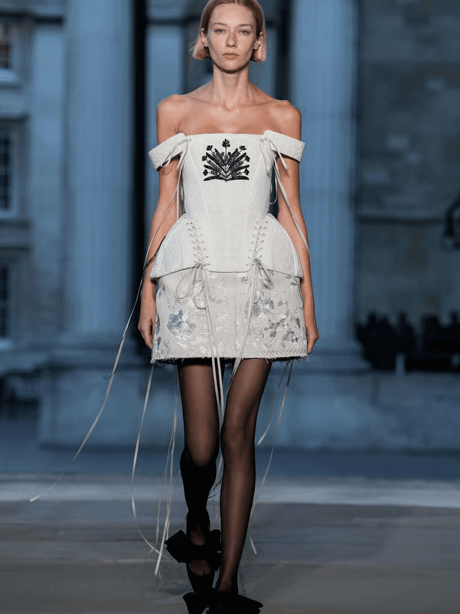 Erdem, Simone Rocha, Kent & Curwen, and Johanna Parv showcased contrasts at London Fashion Week, from nostalgic romance to futuristic minimalism.