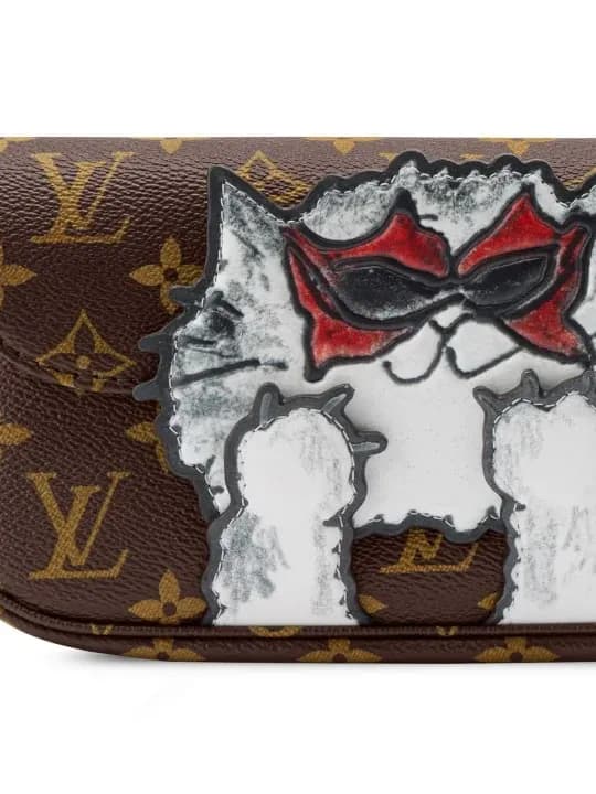 Grace Coddington joins Louis Vuitton for a capsule with cats, vintage motifs and luxury travel pieces blending comfort and style.