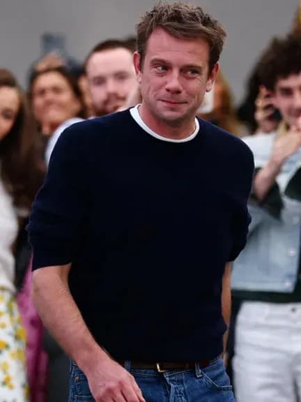 Jonathan Anderson unveils his first Dior womenswear collection at Paris Fashion Week, earning praise and celebrity support.