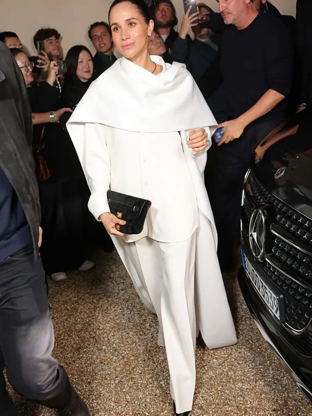 The Duchess of Sussex made a surprise appearance at Balenciaga’s Paris show, supporting designer Pierpaolo Piccioli and showcasing elegant modern style.