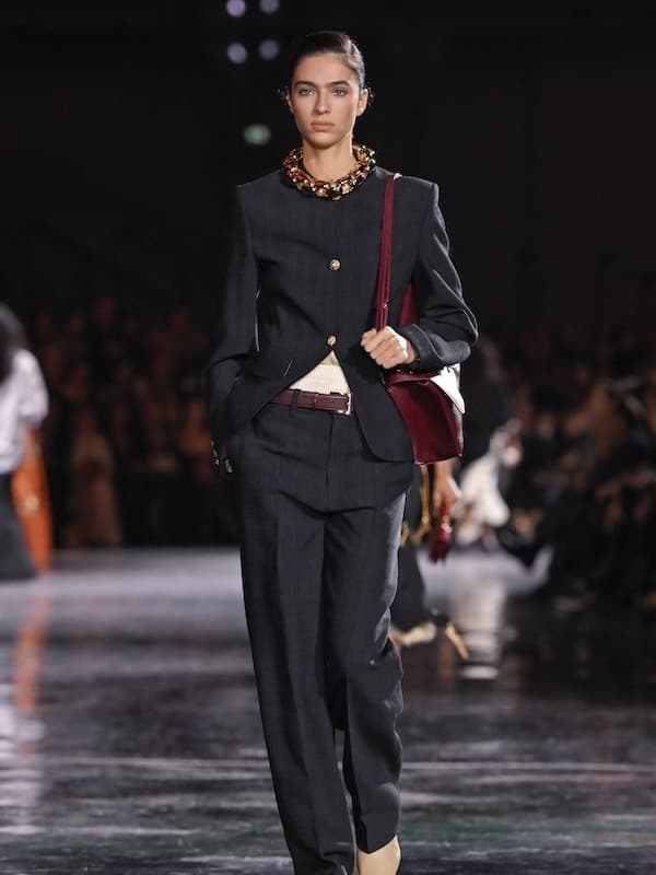 French-Algerian model Loli Bahia turned heads in a sharp tailored look at Matthieu Blazy’s debut Chanel show during Paris Fashion Week.