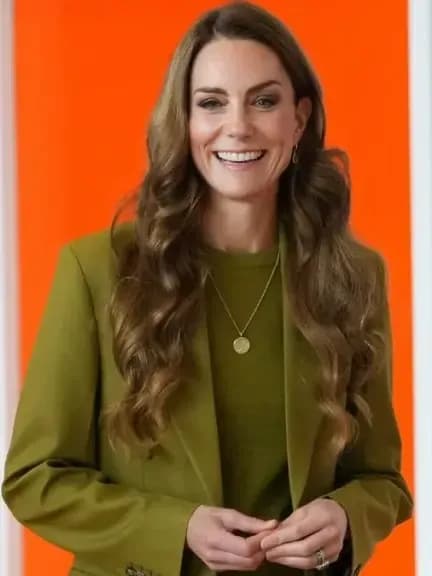 Kate Middleton impressed in a monochrome green Victoria Beckham suit during her Oxford visit, continuing her signature royal power-dressing.