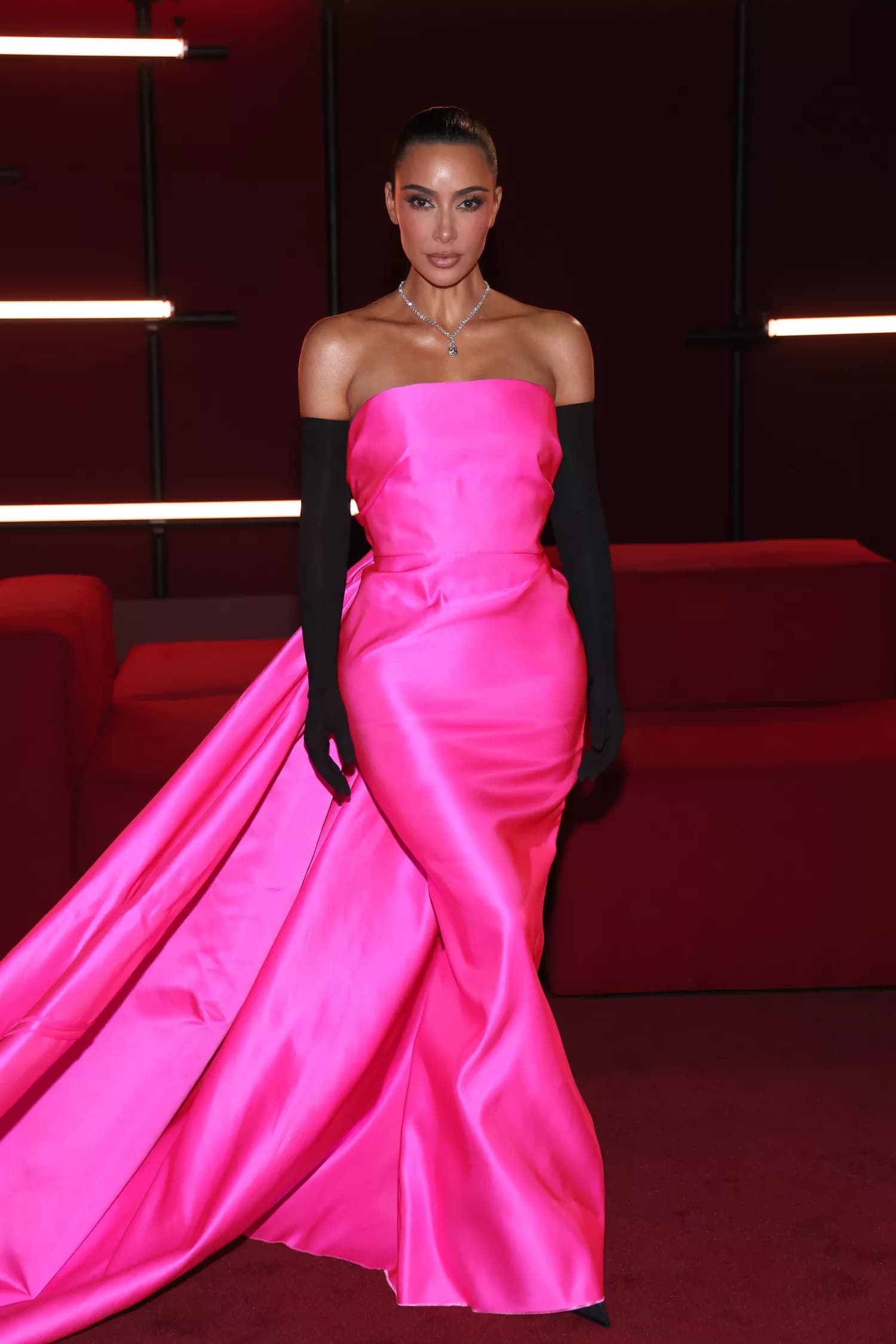 Kim Kardashian Revamps Barbiecore in Pink Gown and Black Gloves