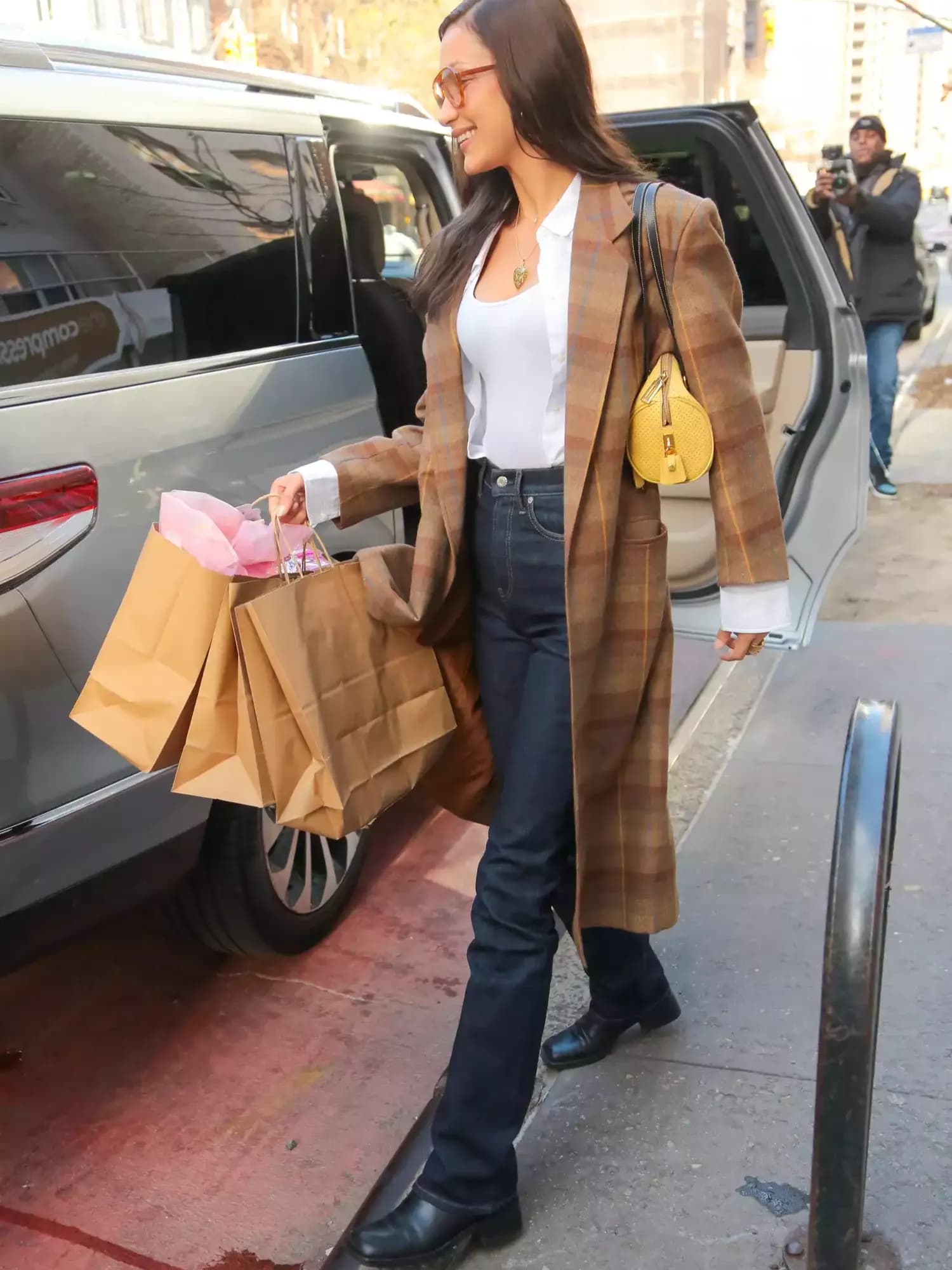 Bella Hadid Embarks on Christmas Shopping in a Festive Coat
