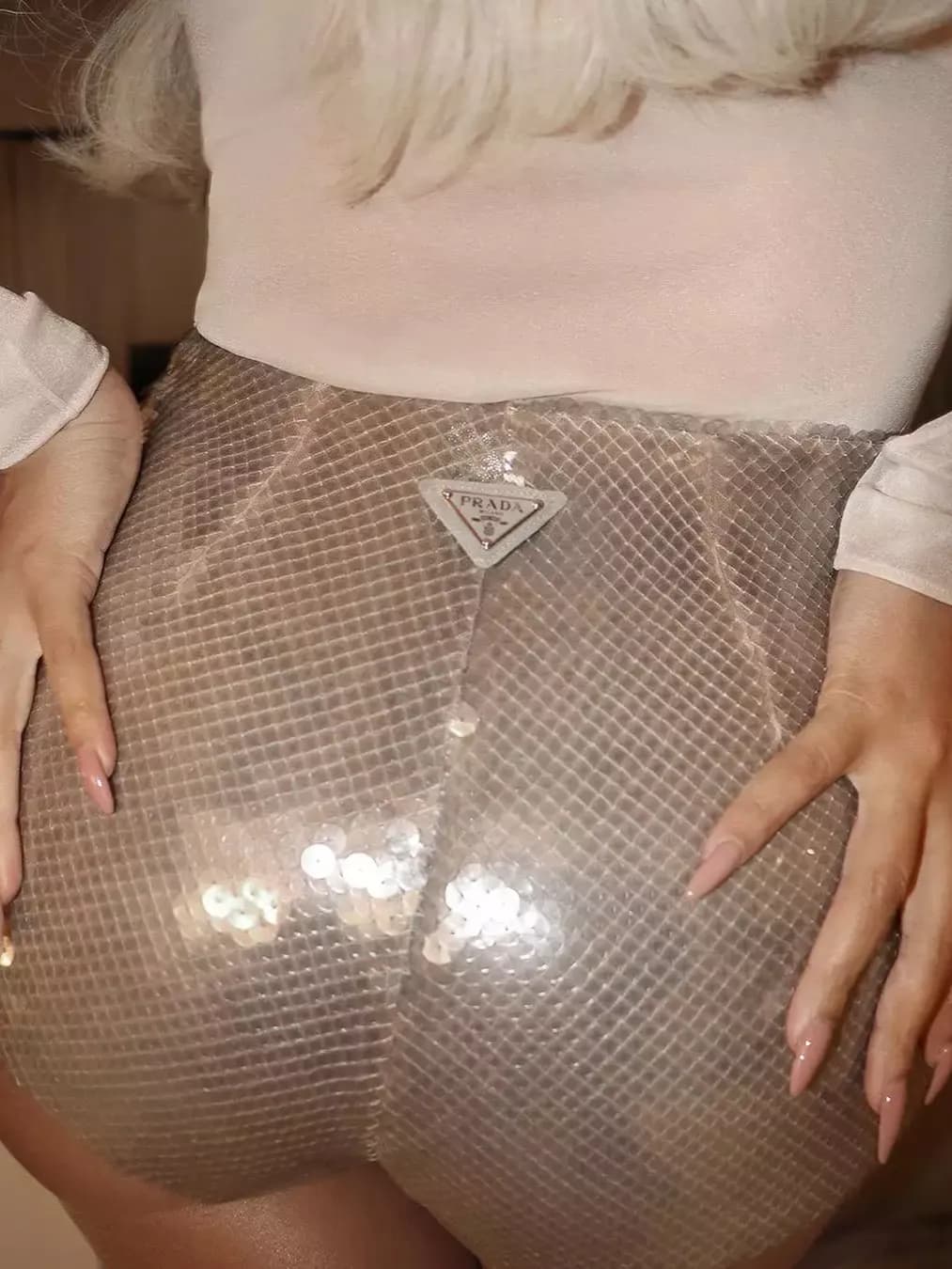 Beyoncé Dazzles in Holiday Style with Glittering Prada Hot Pants for a High-Glam Look