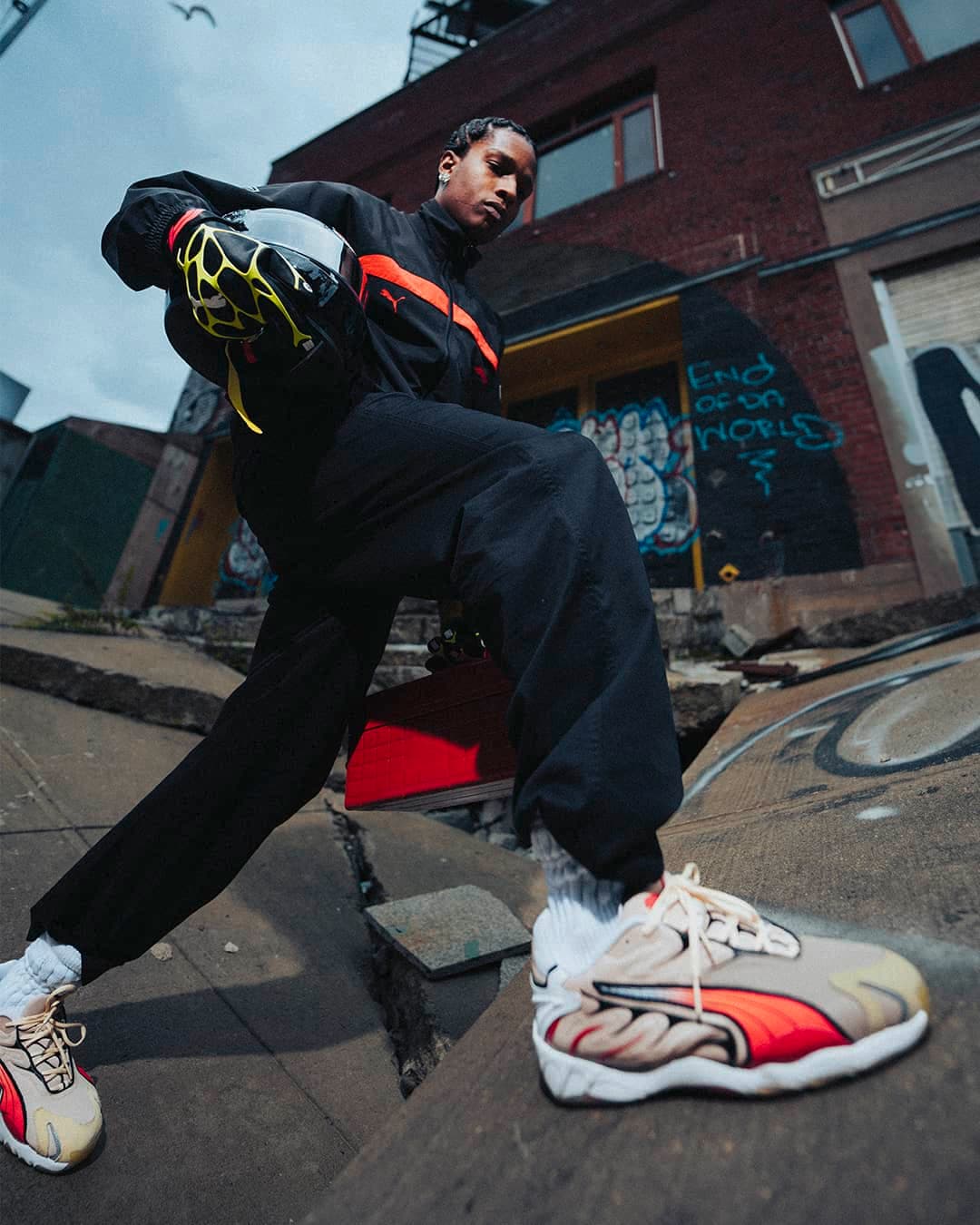 Puma has appointed rapper A$AP Rocky as the creative director for their collaboration with Formula 1. This partnership aims to merge the world of motorsport with streetwear's flair. A$AP Rocky is set to introduce unique capsule designs for the Puma-F1 alliance and will have a hand in shaping Puma's seasonal fashion trajectory. An exclusive Puma x F1 apparel and accessory line is slated for a debut this year, offering a glimpse of multiple capsule collections linked to major F1 events in 2024.