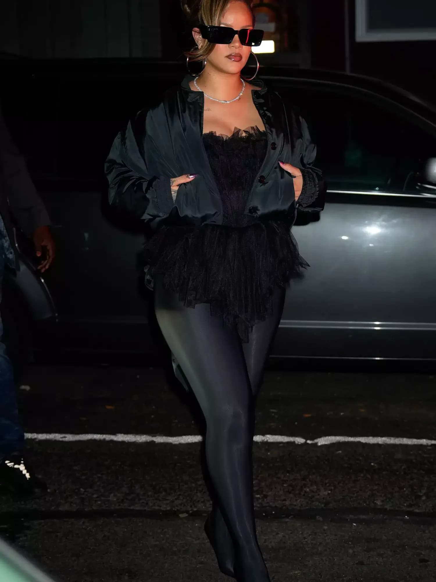Rihanna Stuns in Sheer Bra, Layers of Pearls, and an Oversized Trench Coat