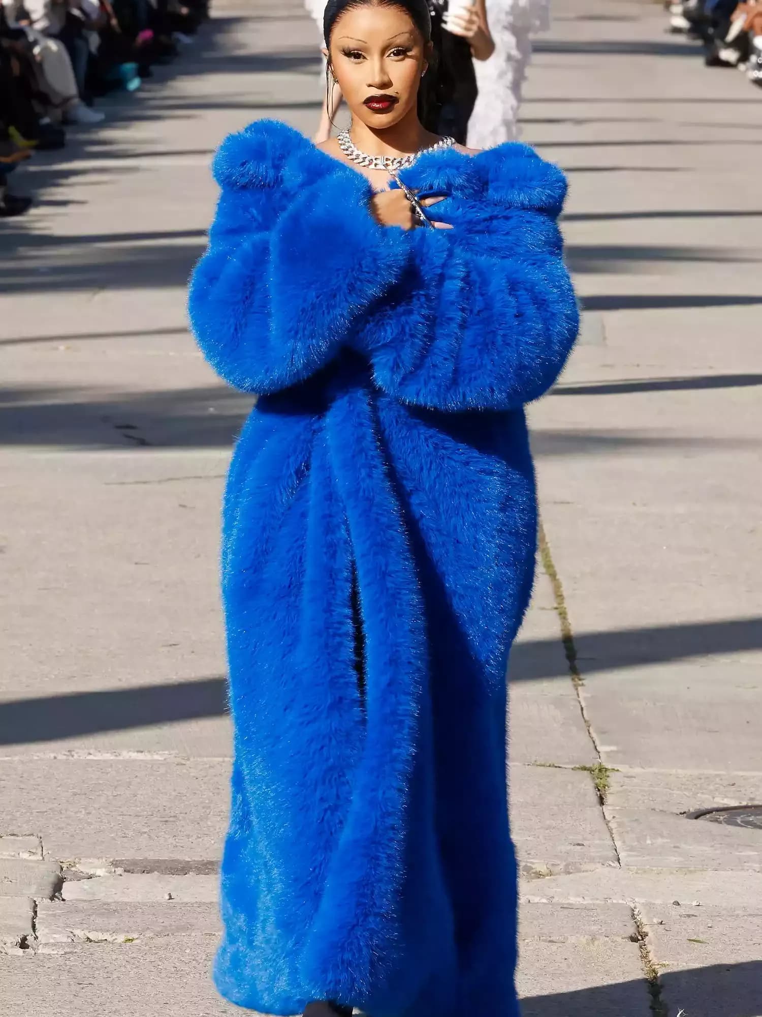 Cardi B Hits the Runway for the First Time in a Striking Fuzzy Cobalt Coat at Balenciaga Show
